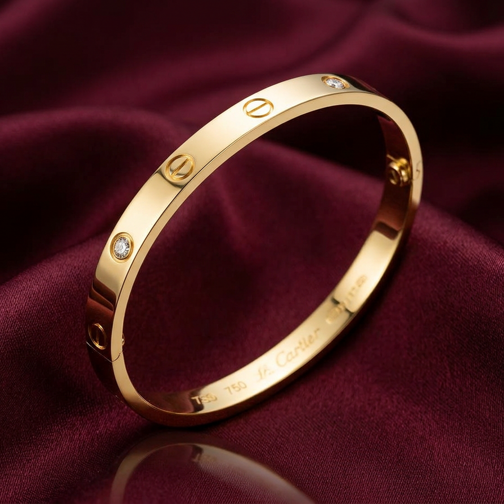 Gold stainless steel bracelet by Zaraya Store featuring screw accents and crystal details, displayed on deep red fabric.