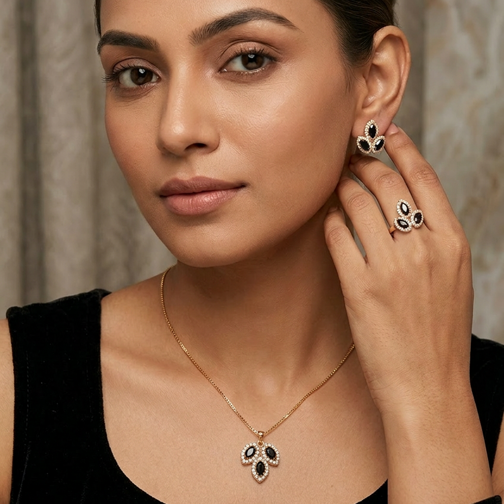 Gold and black leaf stone jewelry set by Zaraya Store, including a necklace, ring, and earrings, displayed on a model.
