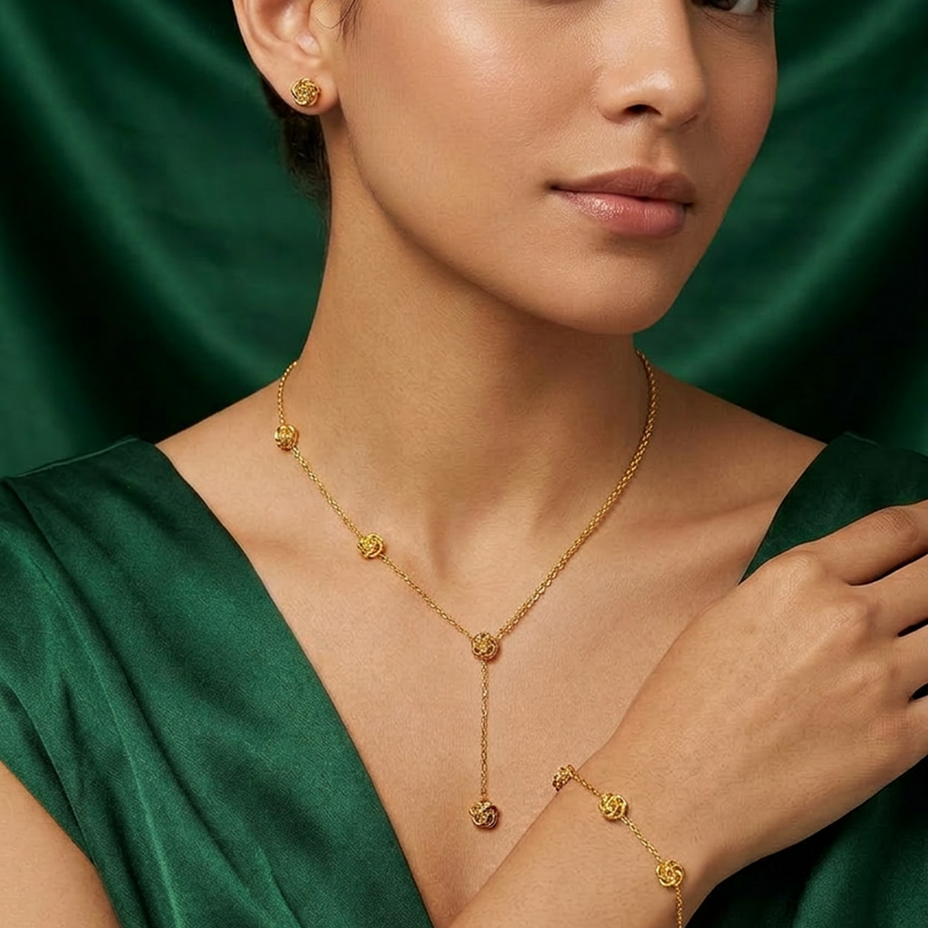 Waterproof gold rose floral jewelry set by Zaraya Store, including necklace, bracelet, and stud earrings on model in green dress.