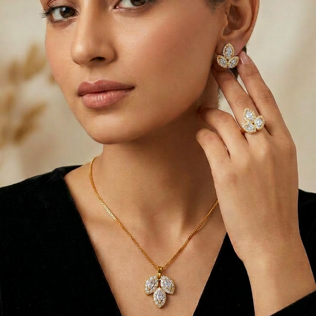 Luxury gold-toned leaf stone jewelry set by Zaraya Store, with matching earrings, ring, and necklace on a woman.